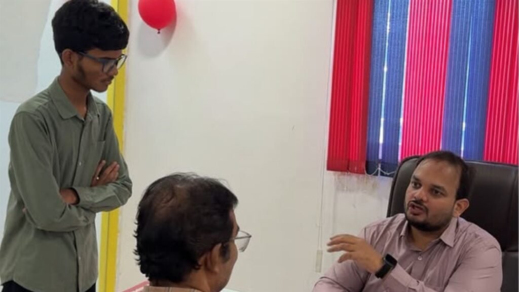 LAKSH management discusses progress with a parent and a senior student at PTM 2, Kisannagar